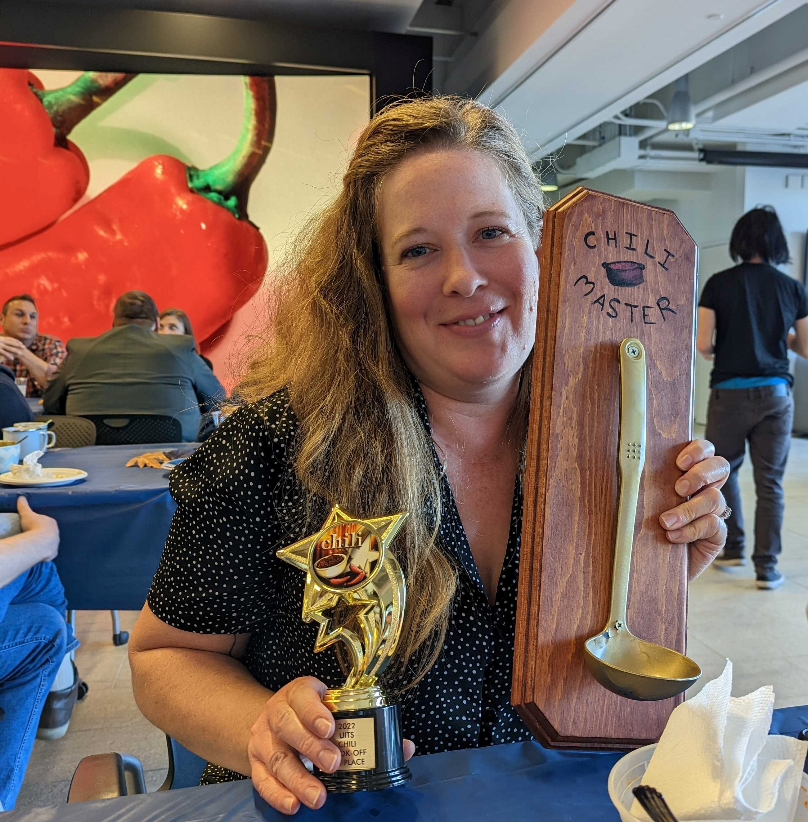 Jeannette Lehr pictured with her first place Chili CookOff trophy.