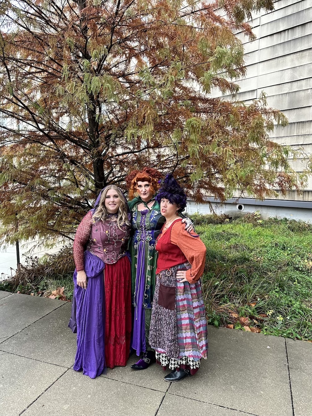 UITS staff members pose as the Sanderson Sisters from Hocus Pocus for Halloween.