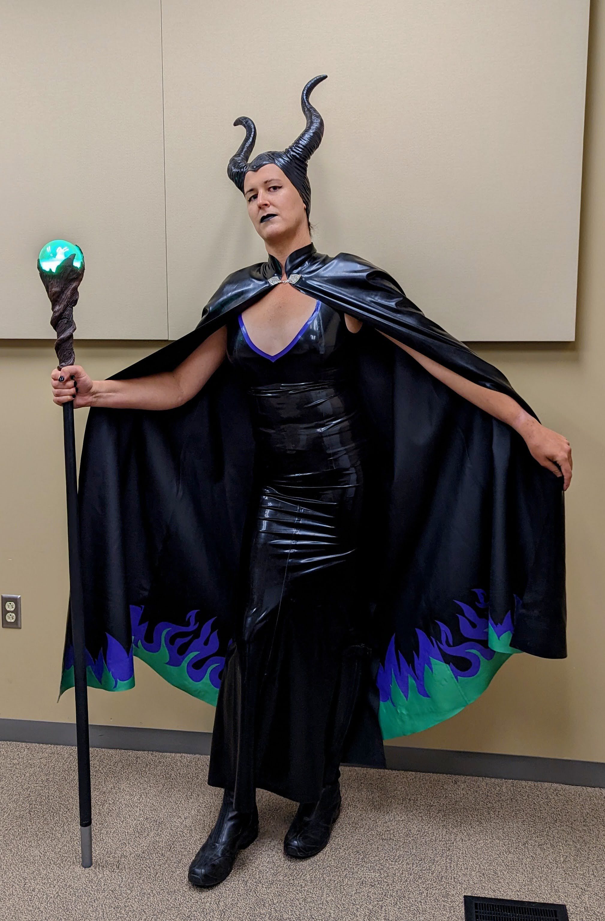 UITS staff member Vale Hettlinger poses as Maleficent from Sleeping Beauty for Halloween.