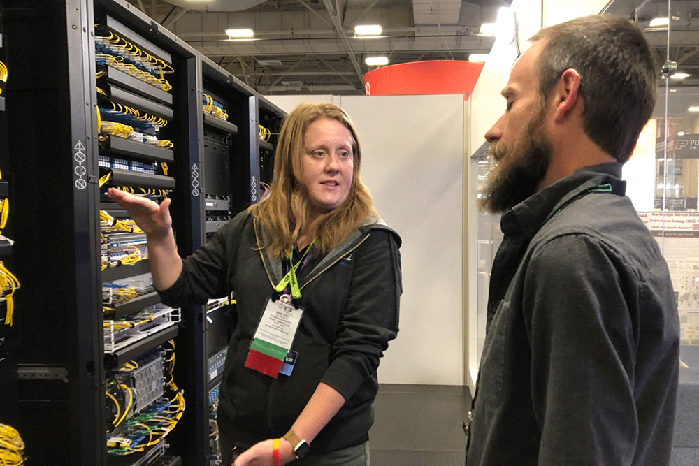 Brenna Meade and Luke Fowler at the SC22 Conference.