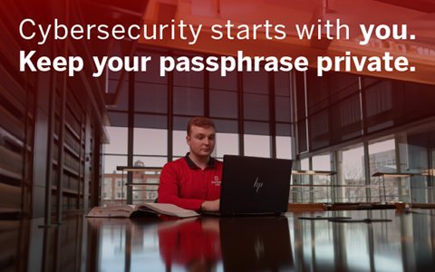 Cybersecurity starts with you. Keep your passphrase private. Above person sitting with laptop