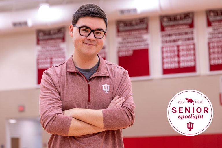 A man stands in a gym
