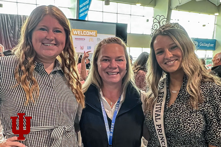 Three women pose for a picture