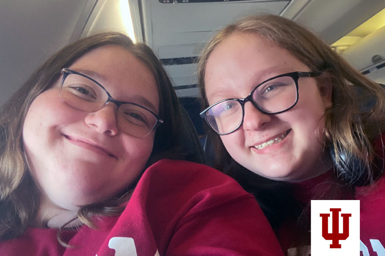 Two women pose for a picture