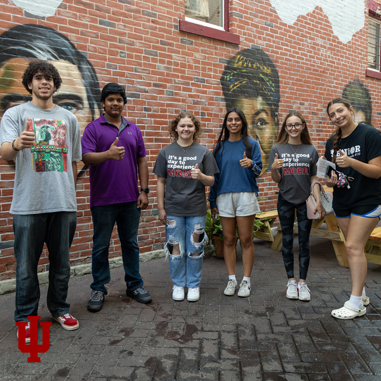 A group of people pose for a picture