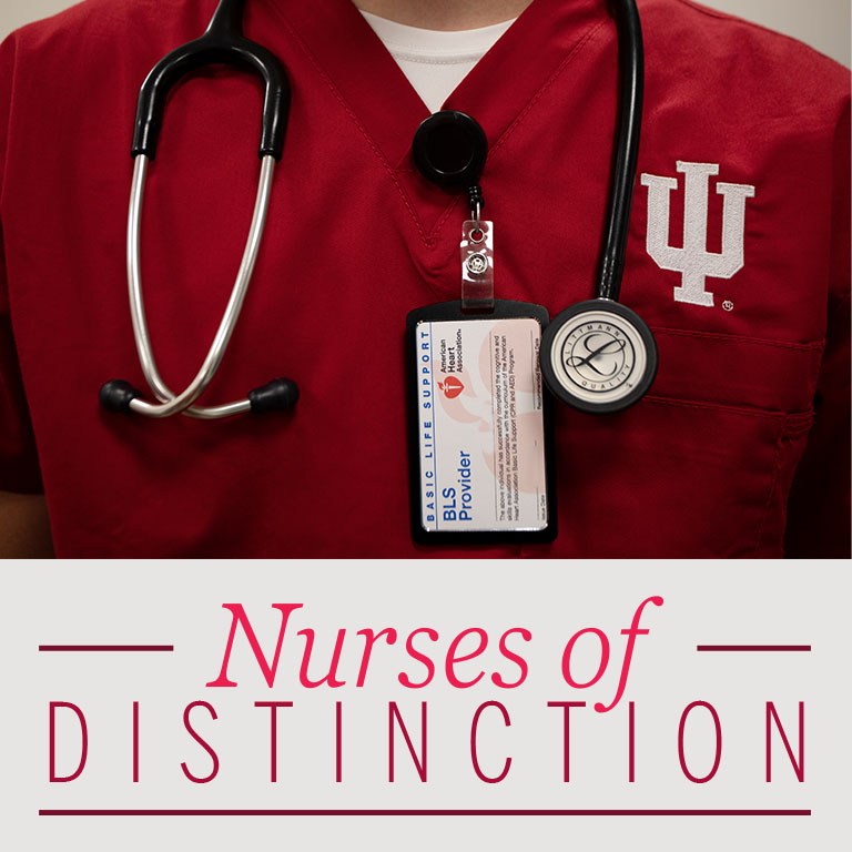 Image of a person wearing red scrubs, medical ID, and a stethoscope