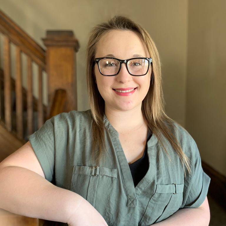 A woman wearing glasses