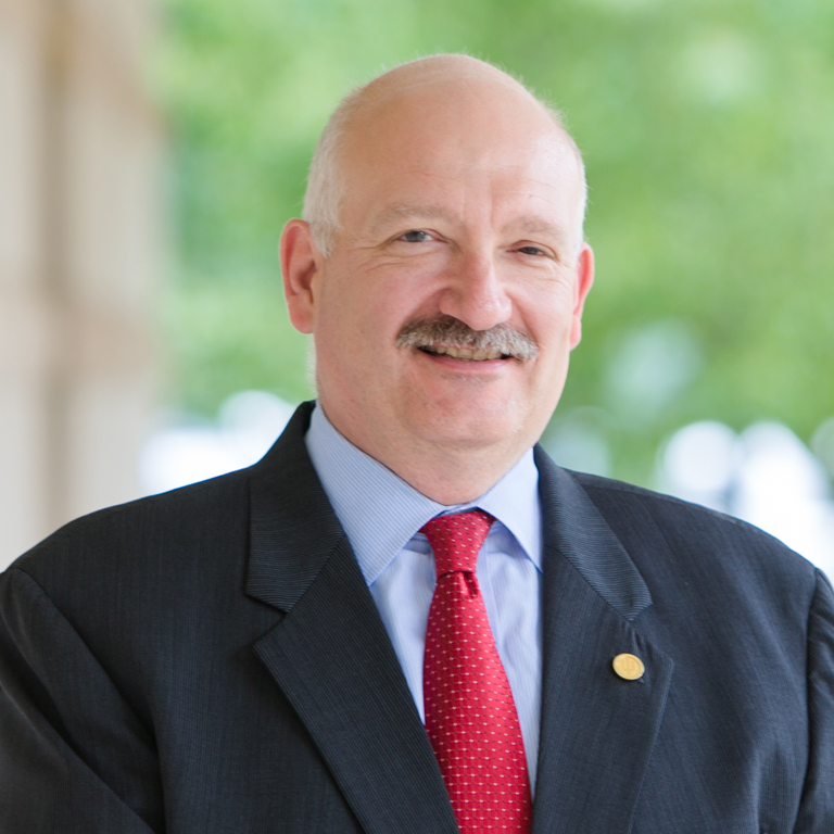 A man poses for a portrait