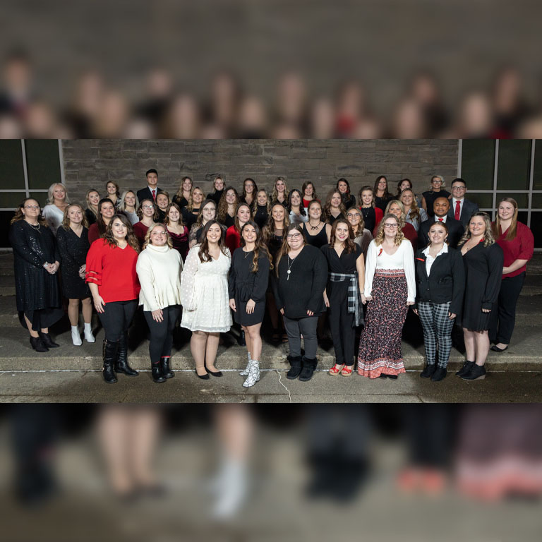 a group picture of nursing graduates