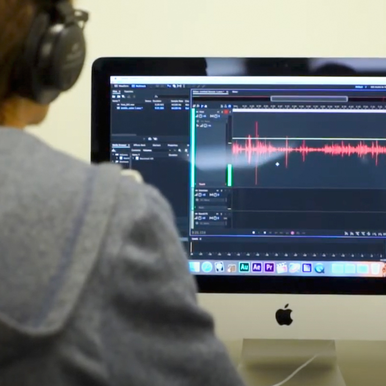 A person looks at a laptop screen