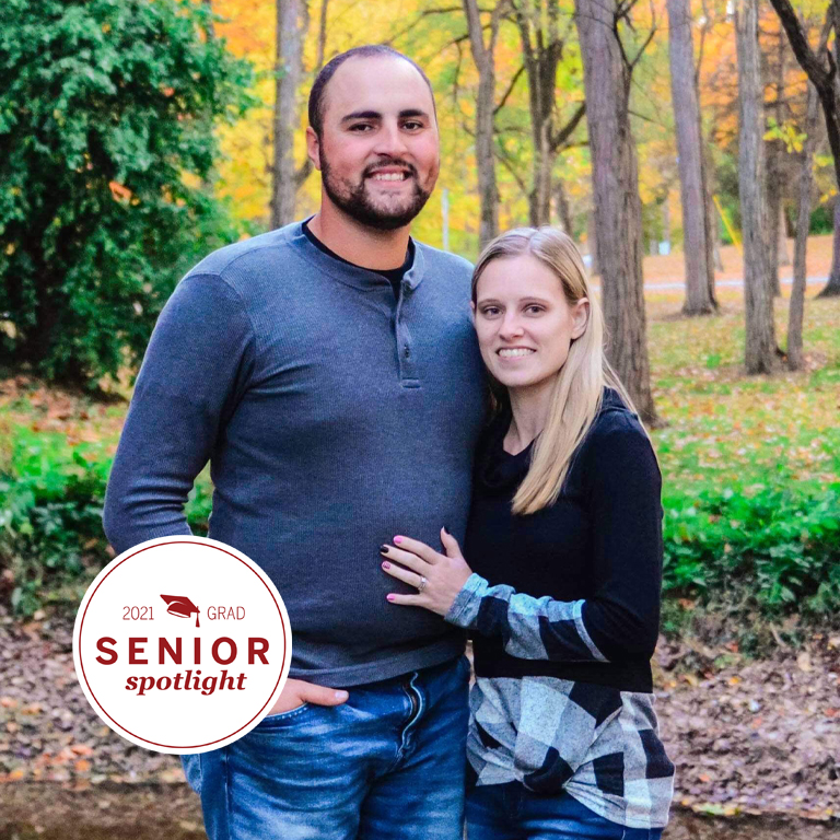 A man and a woman pose for a picture