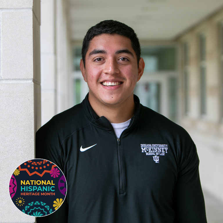 A man smiles for a picture