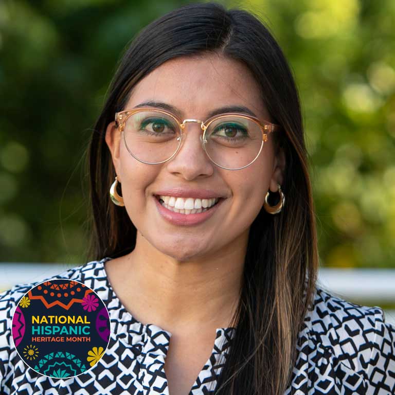 A woman poses for a picture