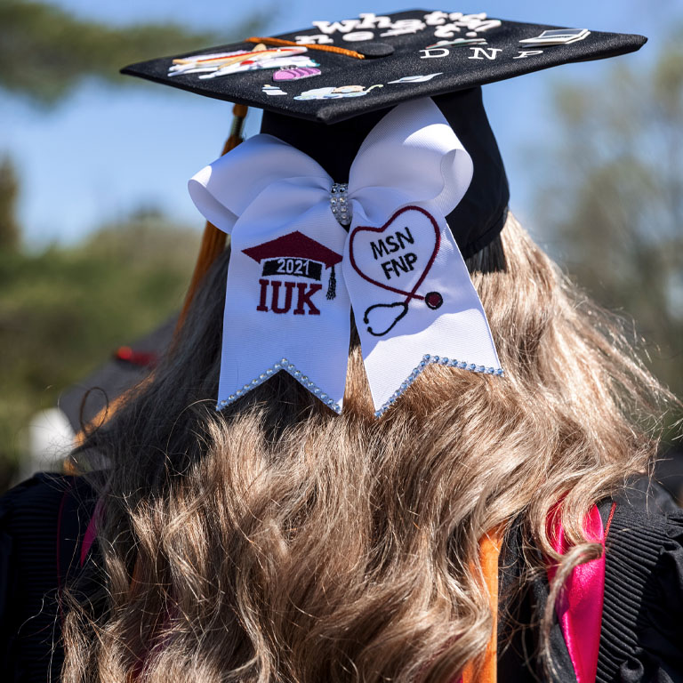 A graduation cap seen from behind
