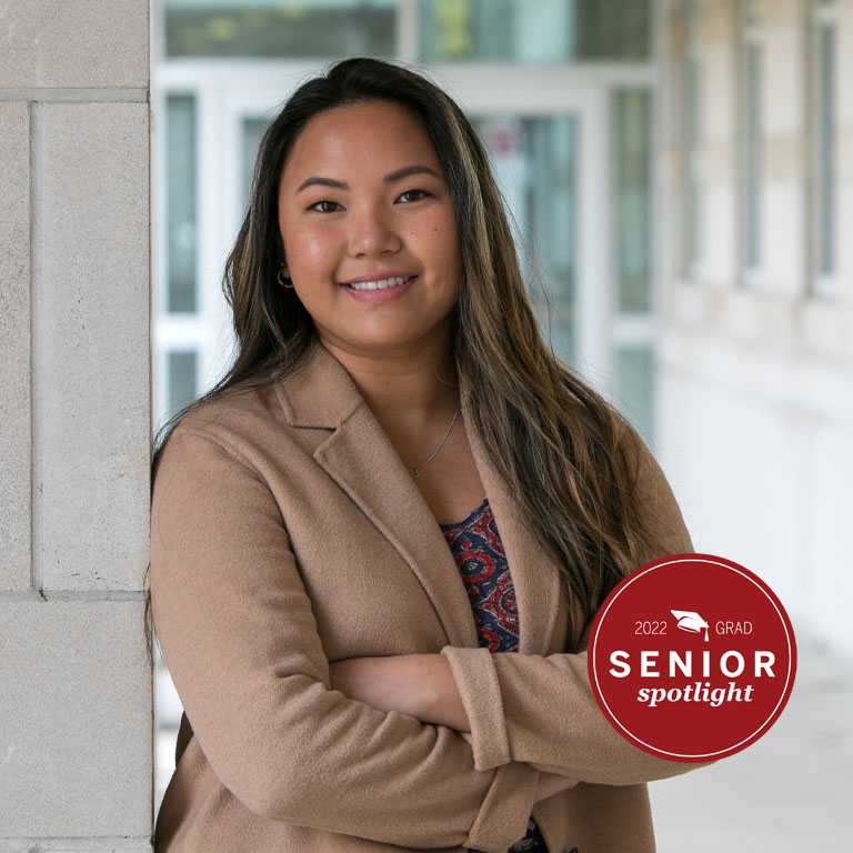 A woman poses for a portrait