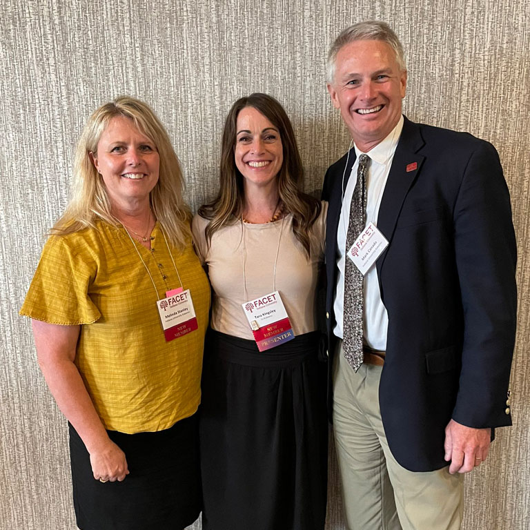 Melinda Stanley (left) and Tara Kingsley (middle) were 2 of 21 IU faculty inducted in FACET. Mark Canada, executive vice chancellor for a...