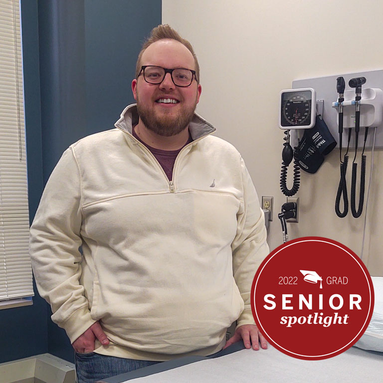 A man stands in a hospital suite