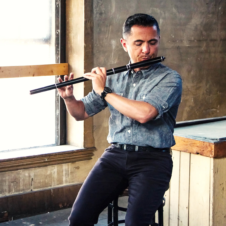 A man plays a Japanese flute