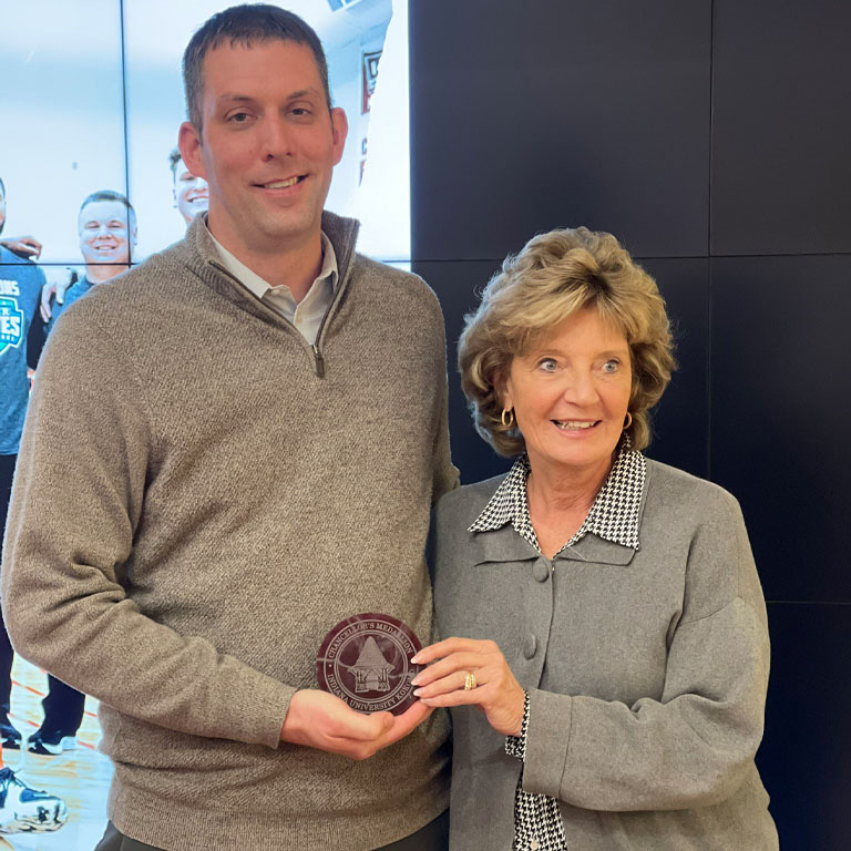 Athletic Director Greg Cooper received the Chancellor's Medallion.