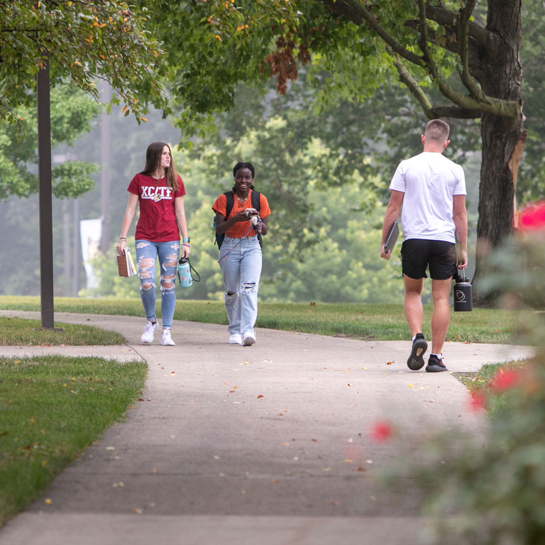 Students walk through the quad