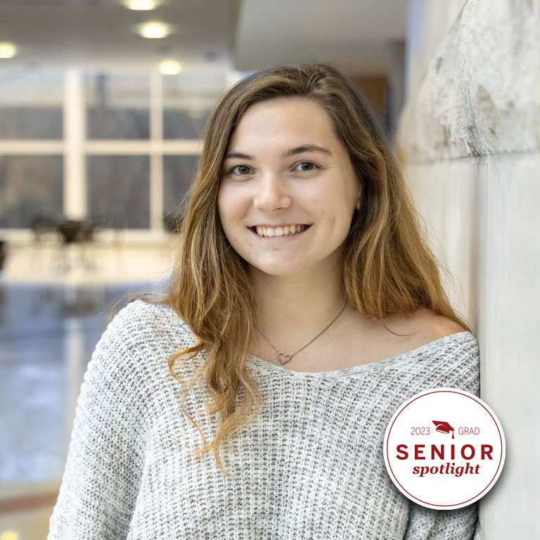 A woman poses for a picture