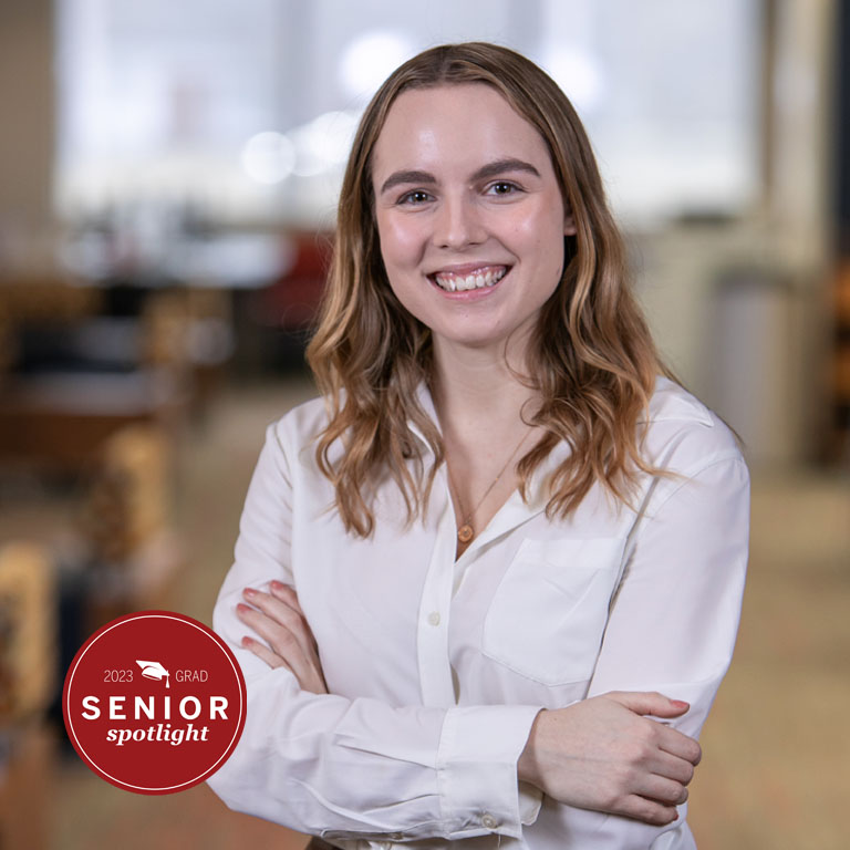 A woman poses for a portrait