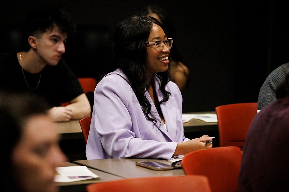 Indiana University graduate student Ashley Hayes answers questions about her team's film Because We Are during a screening of the do...