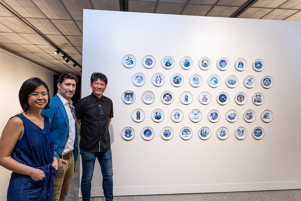 Blurring the Lines co-curators Linda Tien and Caleb Weintraub stand with Arthur Liou, director of IU's AI + Digital Futures initiati...