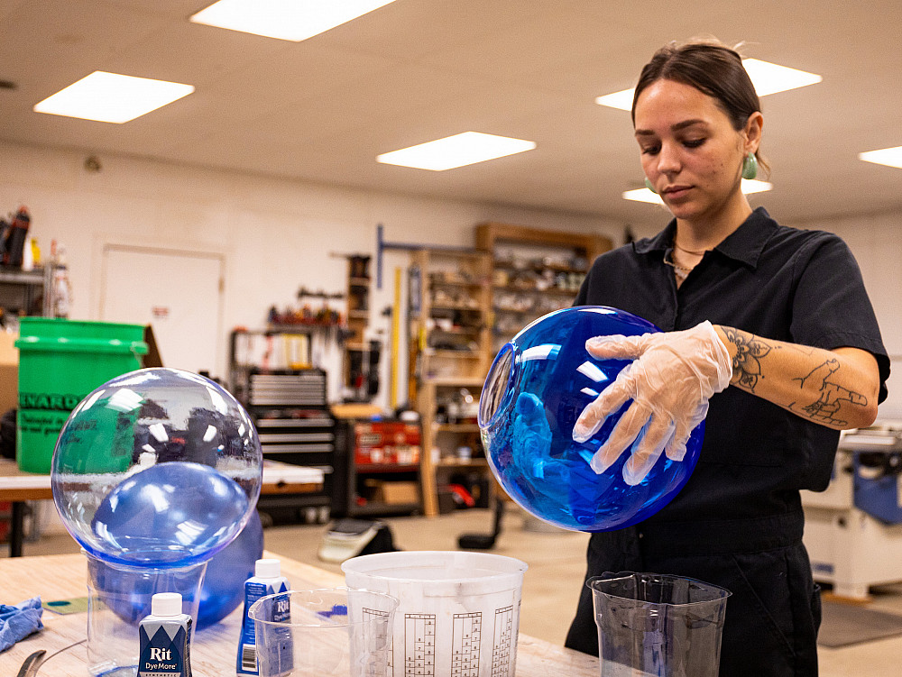 Brenna McCarty's piece, 'Blue Skies,' is the first sculpture to be installed permanently at the airport since the new terminal opened in ...