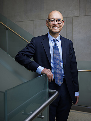 Indiana University Professor Anh Ngoc Tran, seen here in the O'Neill School of Public and Environmental Affairs building, has dedicated his