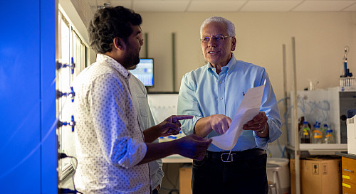 Richard DiMarchi talks to his colleague Kishore Thalluri in his lab at IU Bloomington.