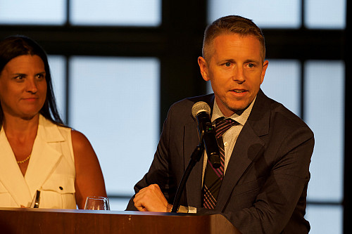 Phil Schuman, right, president of the Higher Education Financial Wellness Alliance and director of financial wellness and education at In...