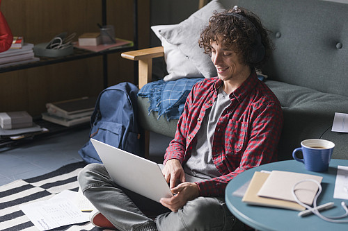 Student looking at laptop