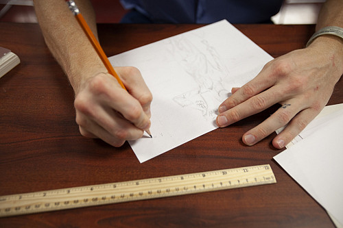 An inmate at Putnamville Correctional Facility draws during the Drawing Your Story class offered through the IU Prison Arts Initiative. P...