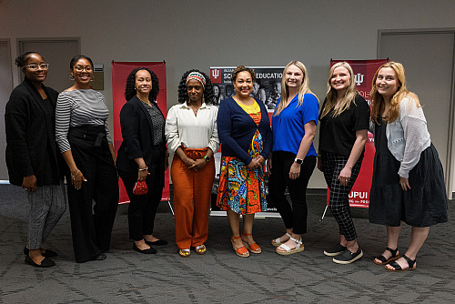 IU School of Education Indianapolis Dean Tambra Jackson (center-right) and professor Tina O'Neal (center-left) prepare students for a stu...