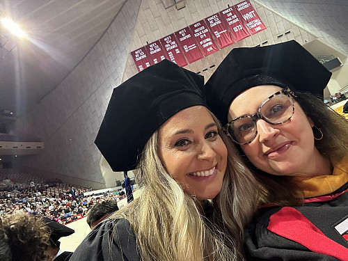 Mary Murphy and a PhD student at graduation.