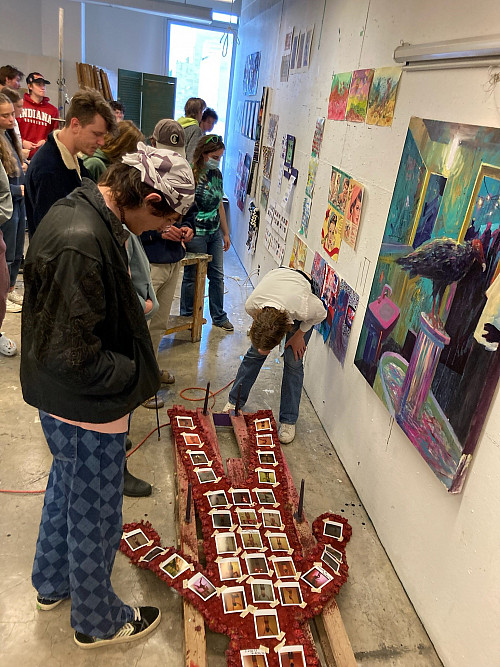 AI in the Studio students observe one another's work during a class critique session. Photo courtesy of Caleb Weintraub