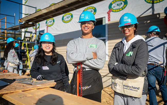 Students and leaders from the Kelley School of Business, with executives from Whirlpool Corporation, participate in home-building activit...