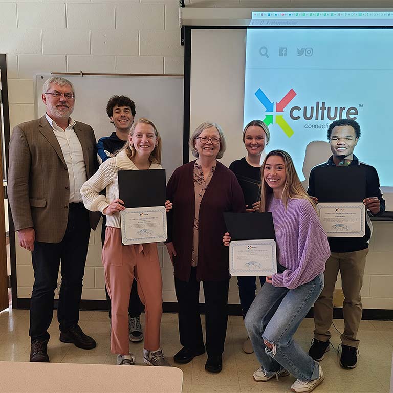 X-Culture participants were given certificates at an award event on Nov. 15. Attending were (from left) assistant professor Arkadiusz Mir...