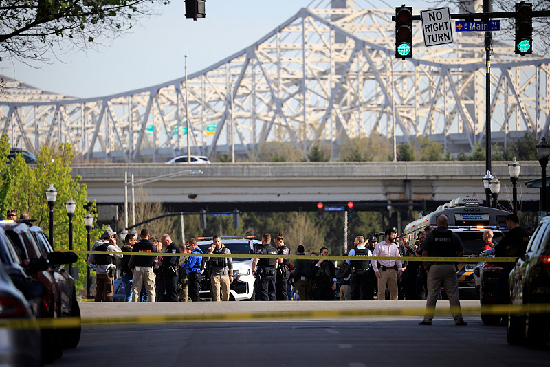 Law enforcement officers respond to an active shooter near the Old National Bank building on April 10, 2023, in Louisville, Kentucky. Get...
