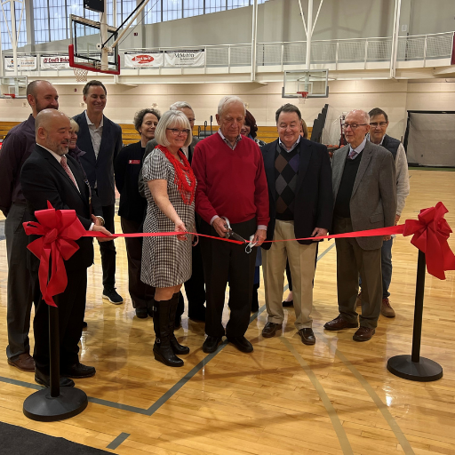 Ribbon-cutting honoring the newly improved athletic facilities thanks to a donation by Terry and Karen McMahon.