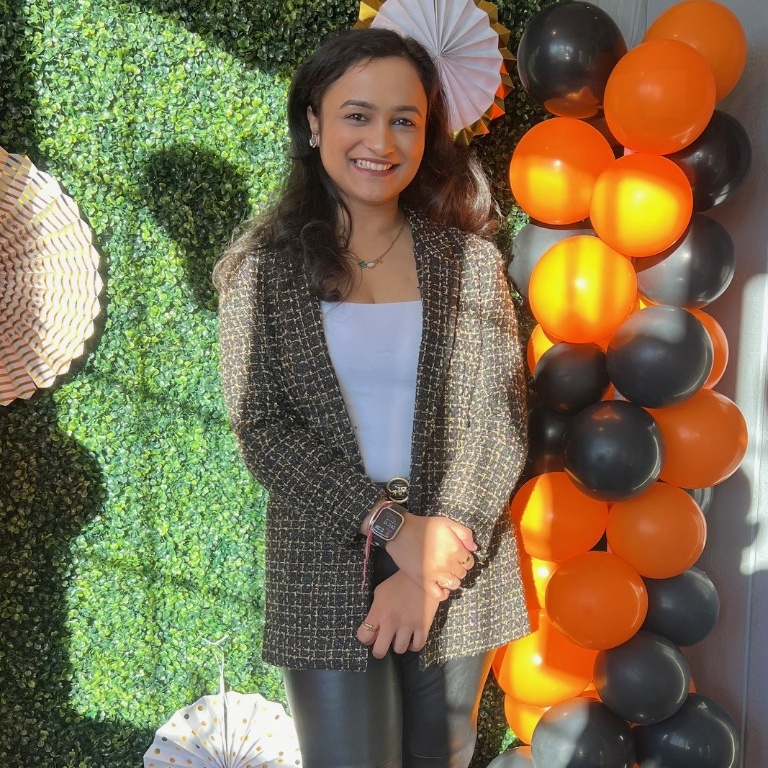 Ruhani Sharma poses for a photo on the opening day of her Griffith restaurant, Tandoori.