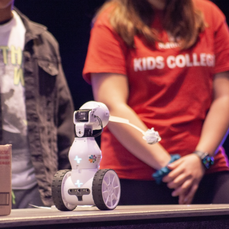 Kids College students in the robotics track show off their robots during the final presentation on June 16, 2023.