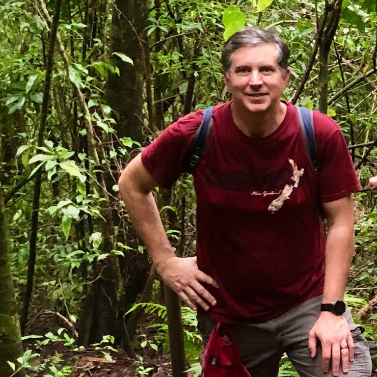 IU Northwest creative writing professor Bill Allegrezza hiking last fall in the woods of Costa Rica.