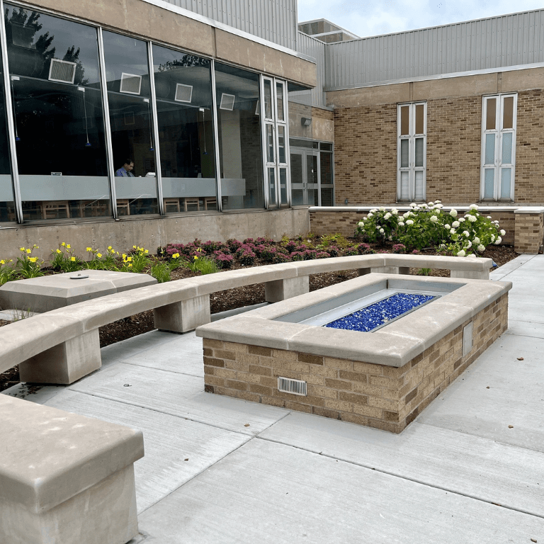 A fireplace in the new location of the Tamarack Green, former spot for Tamarack Hall.