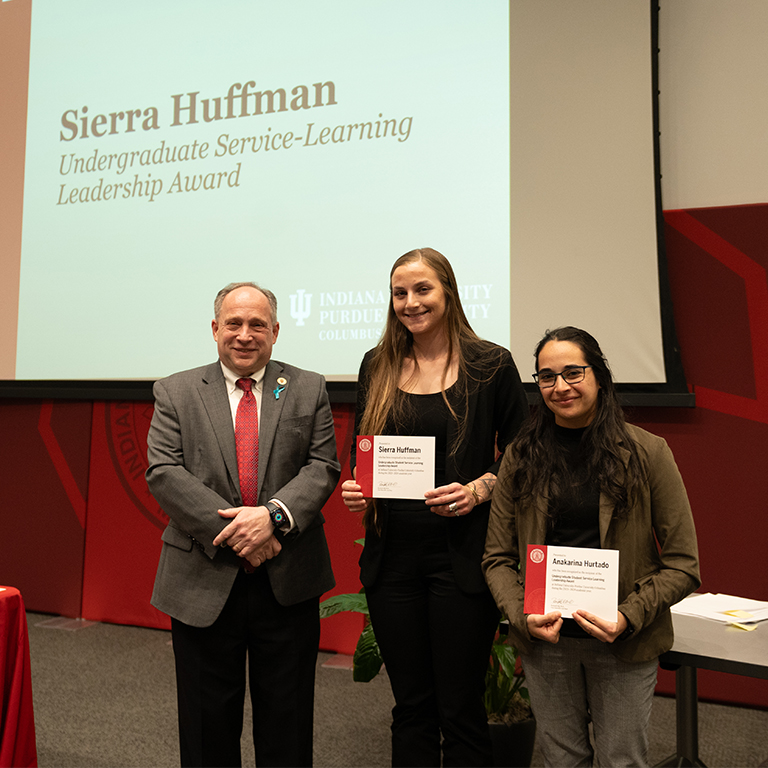 Sierra and Ana accept awards