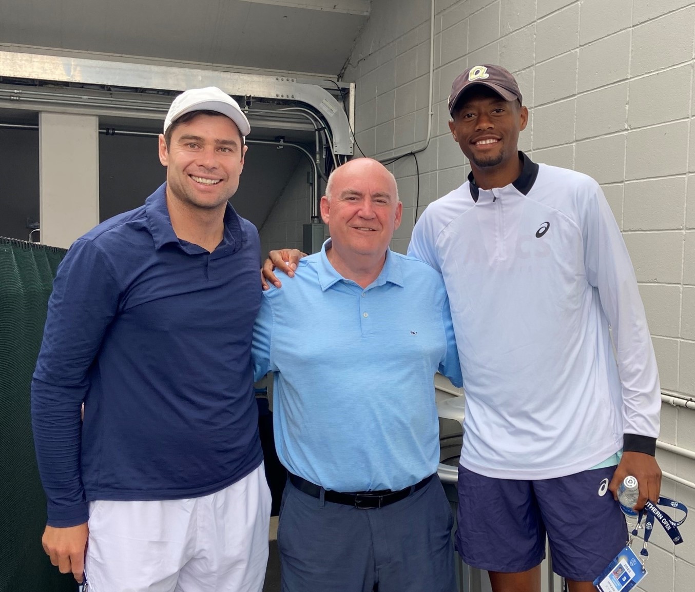 Ruan Roelofse, Tim Scales, Chris Eubanks smiling with their arms behind behind each other's backs