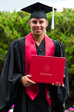 Magda Linette of Poland celebrates graduating from Indian University East at the 2021 Western & Southern Open WTA 1000 tennis tournament