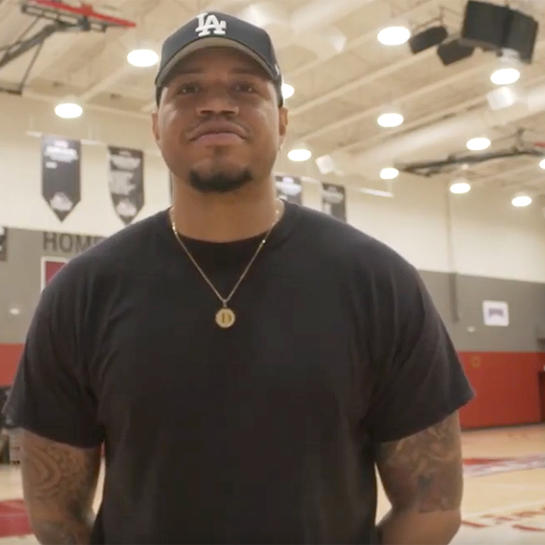 Still from video for IU East Cares Crowdfunding Campaign featuring student in gymnasium