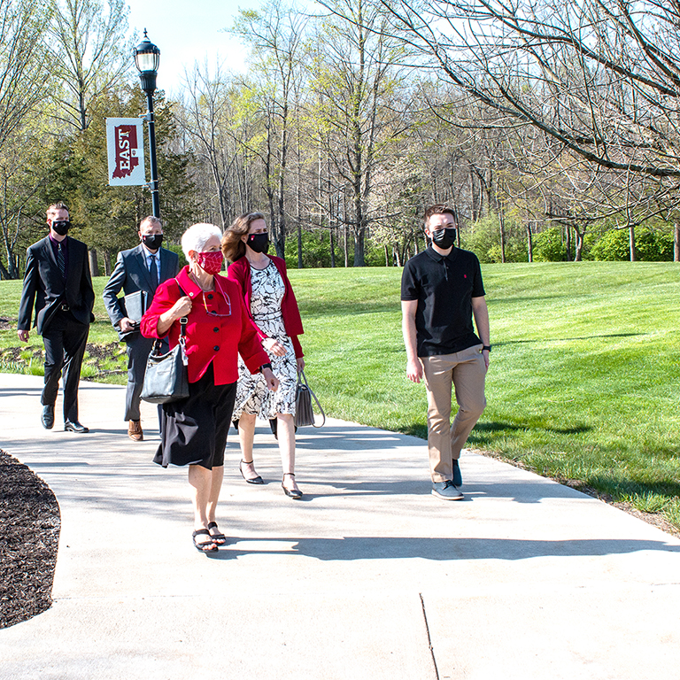 IU President-elect Pamela Whitten touring IU East with Chancellor Kathy Girten, student Zachery Honeycutt, and administrators